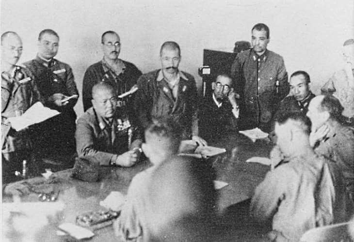 Percival formally surrendering to Yamashita